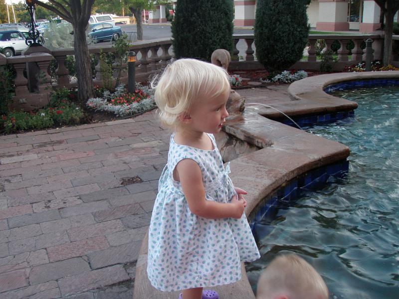 P8100007.JPG - Natalie gazing at the fountain at Casa Bonita