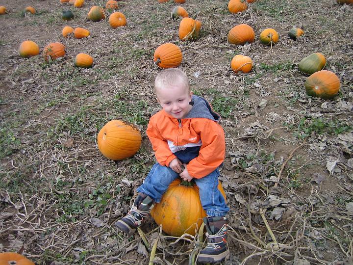 IMG_3381.JPG - Hunter trying out a pumpkin