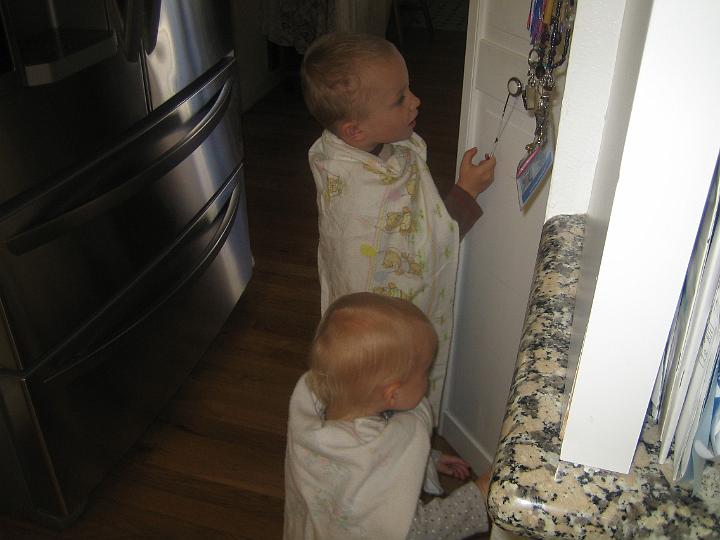 IMG_3567.JPG - super Hunter and super Natalie examine the snacks in the pantry