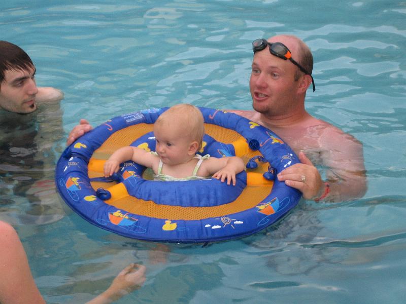 IMG_3135.JPG - Pat and Justin help Natalie in her personal floatation device (pfd)