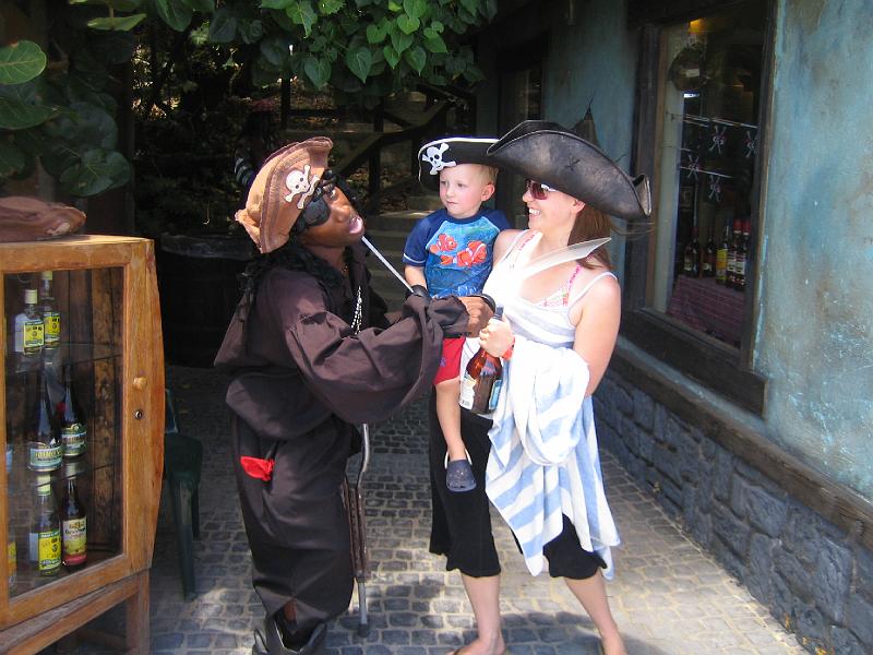 IMG_3189.JPG - Hunter and Shannon threaten a local pirate with their swords