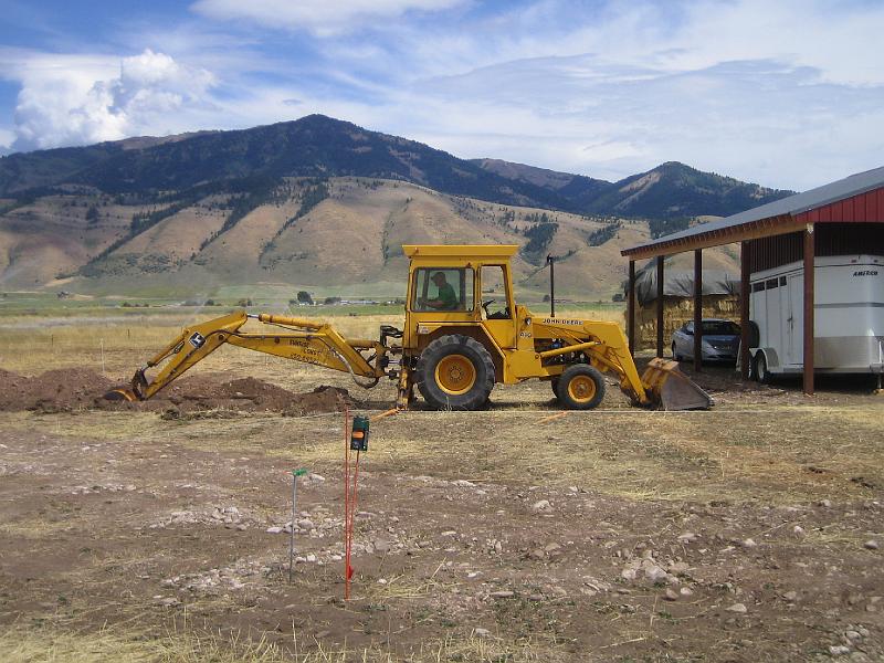 IMG_3270.JPG - Justin digging the trench for the electricity to the barn